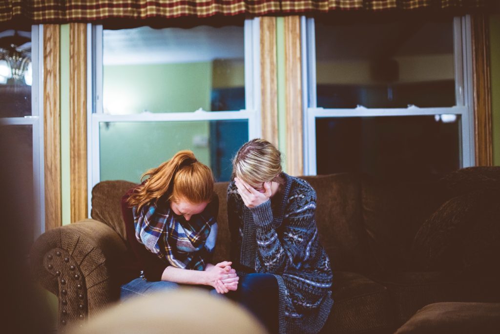 Women helping each other