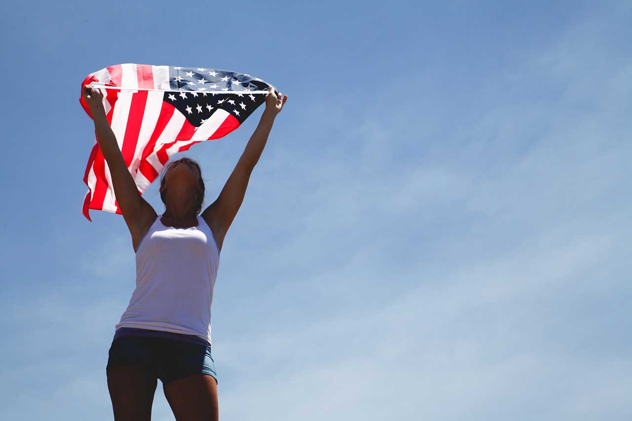 military spouse with flag